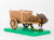 WAG15 Two wheeled open wicker cart with baggage and one Horse