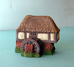 HOV5M5 Water mill half timbered with thatched roof