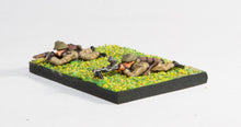 BRIT5 British 1939-45: Three Bren gunners and three second gunners laying/firing