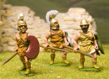 MP44 Peltast advancing in Assorted Helmets