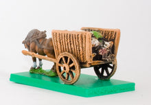WAG15 Two wheeled open wicker cart with baggage and one Horse