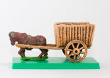 WAG16 Two wheeled open wicker crate with baggage and one Ox