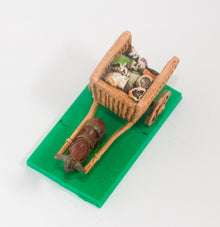 WAG16 Two wheeled open wicker crate with baggage and one Ox